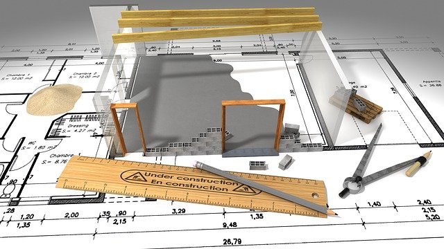 3d image of building in construction over a floorplan