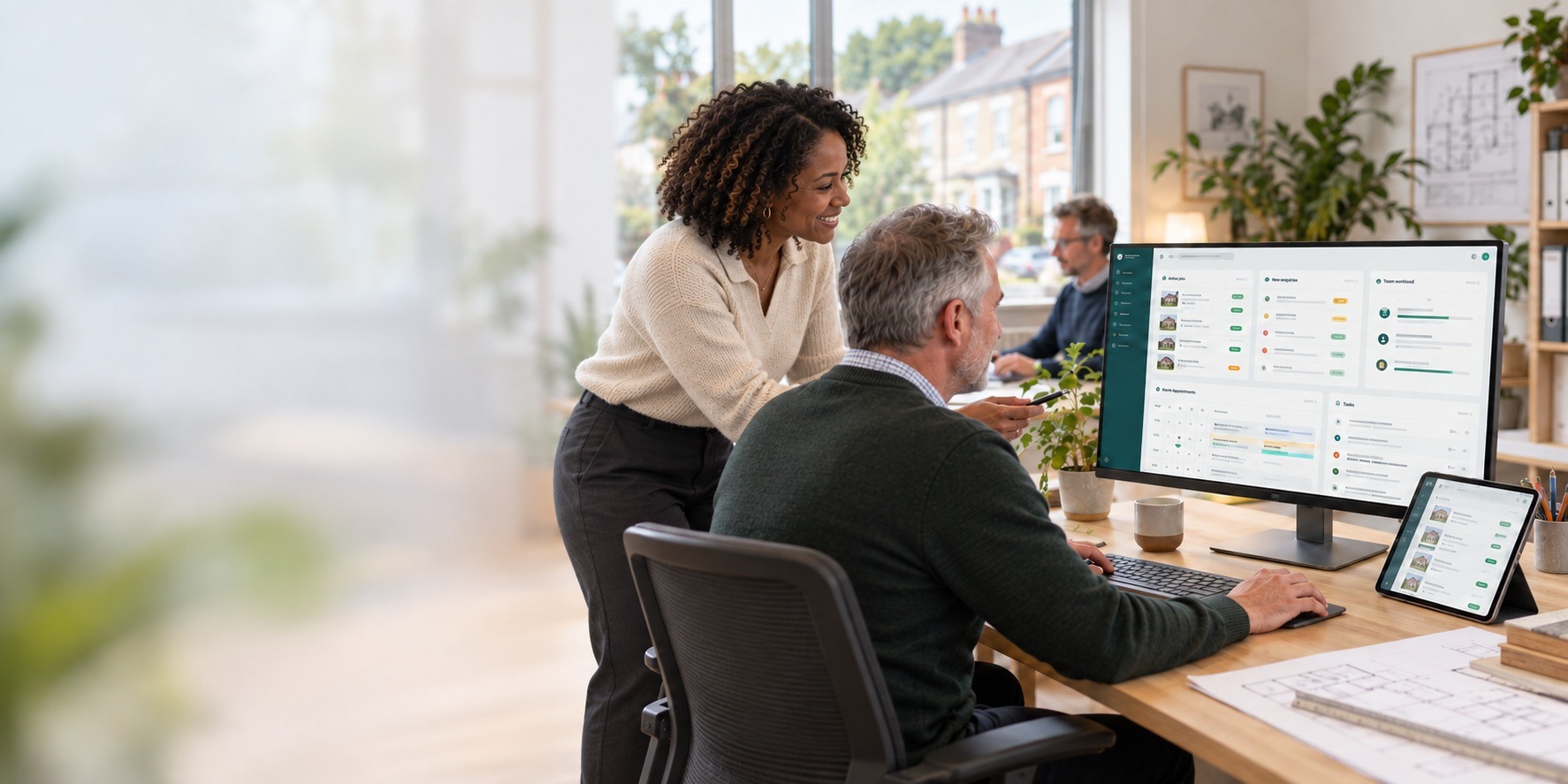 Surveying colleagues collaborating in an office